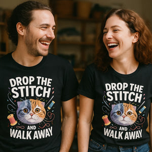 Person wearing the black t shirt sewing pattern graphic tee - "Drop the Stitch and Walk Away" design