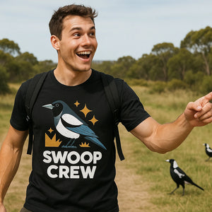 Lifestyle shot of the "Swoop Crew" black magpie t shirt in a real-world setting