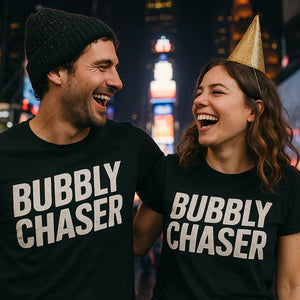 Person wearing the black fun new years shirts graphic tee - "Bubbly Chaser" design