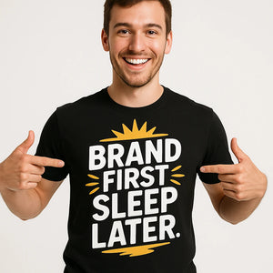 Close-up of the "Brand First Sleep Later" white print on a premium Bella+Canvas black entrepreneurs t shirt