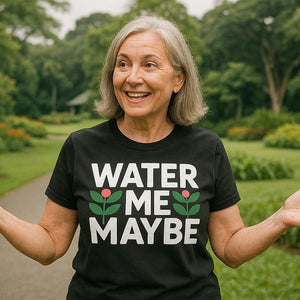 Lifestyle shot of the "Water Me Maybe" black botany t shirt in a real-world setting