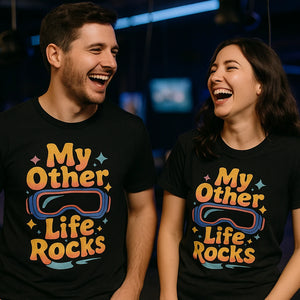 Person wearing the black virtual reality t shirt graphic tee - "My Other Life Rocks" design