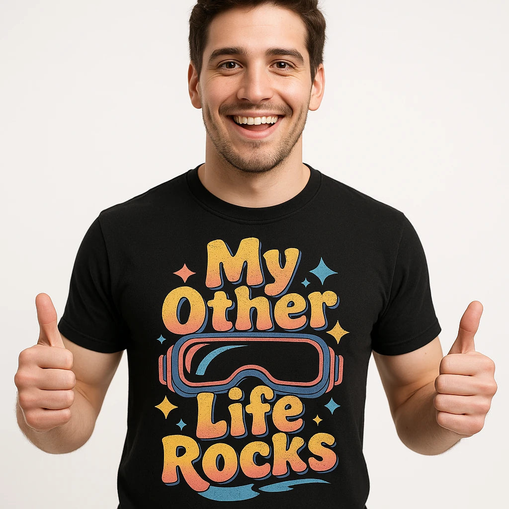 Close-up of the "My Other Life Rocks" gold print on a premium Bella+Canvas black virtual reality t shirt