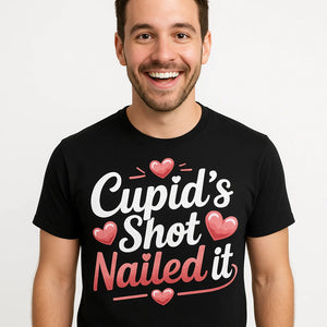 Close-up of the "Cupid’S Shot Nailed It" pink print on a premium Bella+Canvas black relationships shirts