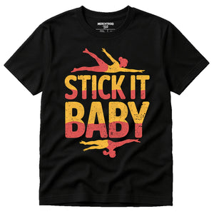 Black Gymnastics T Shirt Designs - "Stick It Baby" graphic tee with yellow print, flat lay product photo