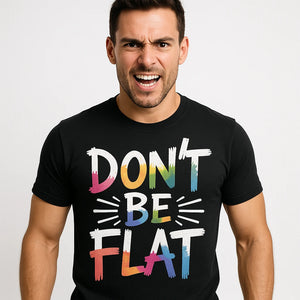 Close-up of the "Dont Be Flat" white print on a premium Bella+Canvas black virtual reality t shirt