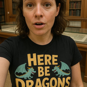 "Here Be Dragons" black cartographer shirts, photographed as cartographer gift