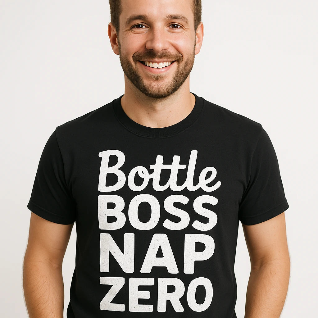 Close-up of the "Bottle Boss Nap Zero" white print on a premium Bella+Canvas black new parents shirts