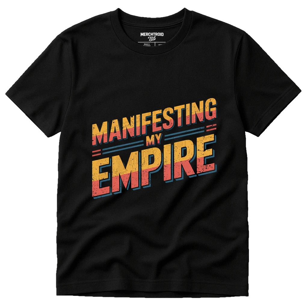 Black Entrepreneurs Shirts - "Manifesting My Empire" graphic tee with orange print, flat lay product photo