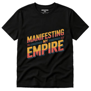 Black Entrepreneurs Shirts - "Manifesting My Empire" graphic tee with orange print, flat lay product photo