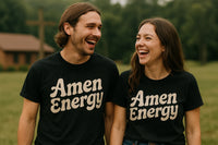 A man and a woman, both wearing black t-shirts with the text 