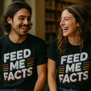 Person wearing the black studying t shirt graphic tee - "Feed Me Facts" design