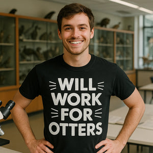 Lifestyle shot of the "Will Work for Otters" black zoology t shirt in a real-world setting