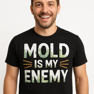 Close-up of the "Mold Is My Enemy" white print on a premium Bella+Canvas black archivist t shirt