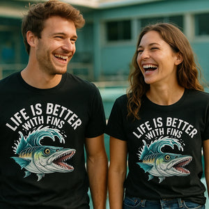 Person wearing the black heart barracuda t shirt graphic tee - "Life Is Better With Fins" design