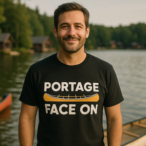 Lifestyle shot of the "Portage Face On" black canoeing shirts in a real-world setting