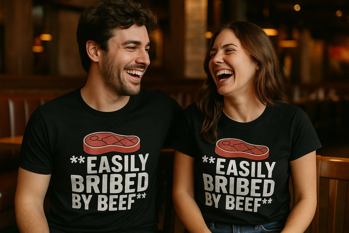 Person wearing the black steak shirts graphic tee - "Easily Bribed By Beef" design