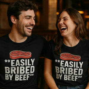 Person wearing the black steak shirts graphic tee - "Easily Bribed By Beef" design