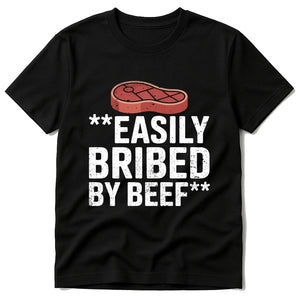 Black Steak Shirts - "Easily Bribed By Beef" graphic tee with white print, flat lay product photo