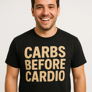 Close-up of the "Carbs Before Cardio" tan print on a premium Bella+Canvas black pasta t shirt