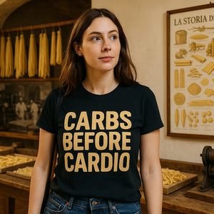 Lifestyle shot of the "Carbs Before Cardio" black pasta t shirt in a real-world setting