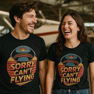 Person wearing the black pilot shirts graphic tee - "Sorry Can'T Flying" design