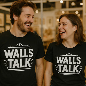 Person wearing the black interior designer t shirt graphic tee - "Walls Talk" design