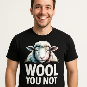 Close-up of the "Wool You Not" white print on a premium Bella+Canvas black black sheep t shirt