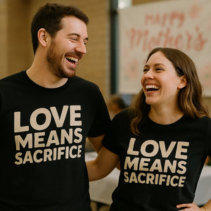 Person wearing the black mom sacrifice t shirt graphic tee - "Love Means Sacrifice" design