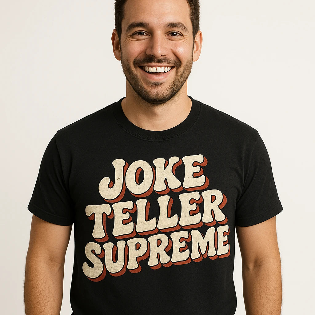 Close-up of the "Joke Teller Supreme" beige print on a premium Bella+Canvas black dad and son matching t shirts