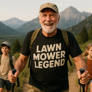 Lifestyle shot of the "Lawn Mower Legend" black dad tee in a real-world setting