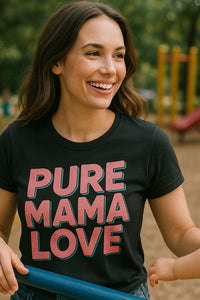 A woman with long brown hair is smiling while holding onto a blue bar. She is wearing a black t-shirt with the text 