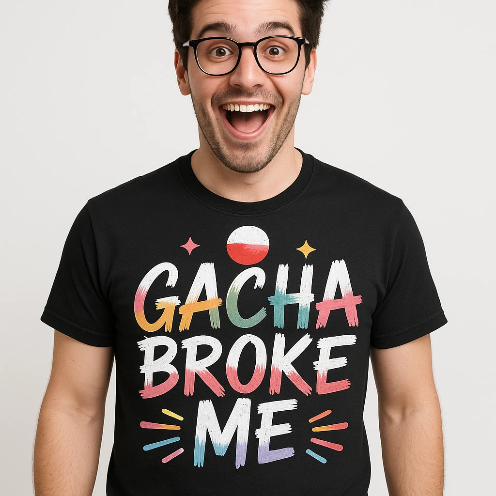 Close-up of the "Gacha Broke Me" white print on a premium Bella+Canvas black tokyo t shirt