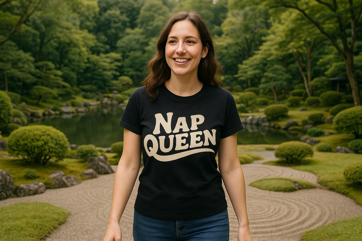 Lifestyle shot of the "Nap Queen" black relaxing t shirt in a real-world setting