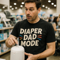 A person wearing a black t-shirt with the text 