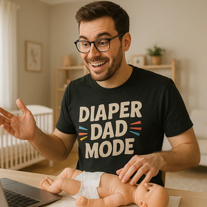 Lifestyle shot of the "Diaper Dad Mode" black diaper duty shirts in a real-world setting