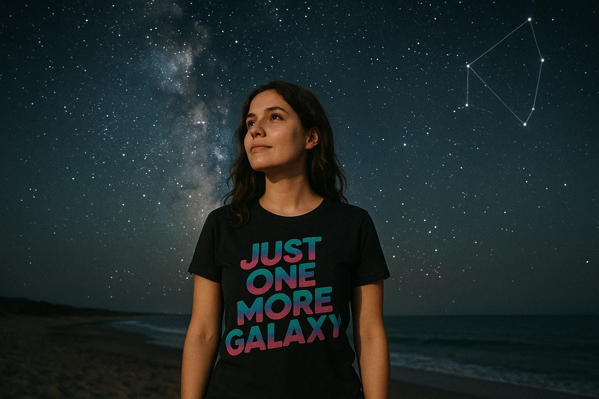 Lifestyle shot of the "Just One More Galaxy" black stargazing shirts in a real-world setting