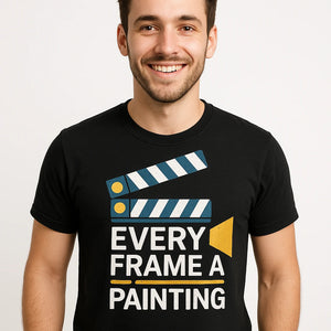 Close-up of the "Every Frame a Painting" white print on a premium Bella+Canvas black film director shirts