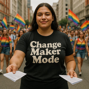 Lifestyle shot of the "Change Maker Mode" black activism shirts in a real-world setting
