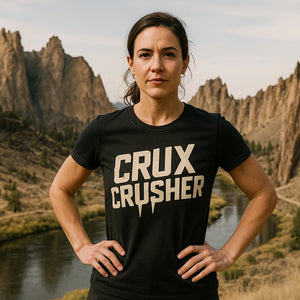Lifestyle shot of the "Crux Crusher" black rock climbing tee shirts in a real-world setting