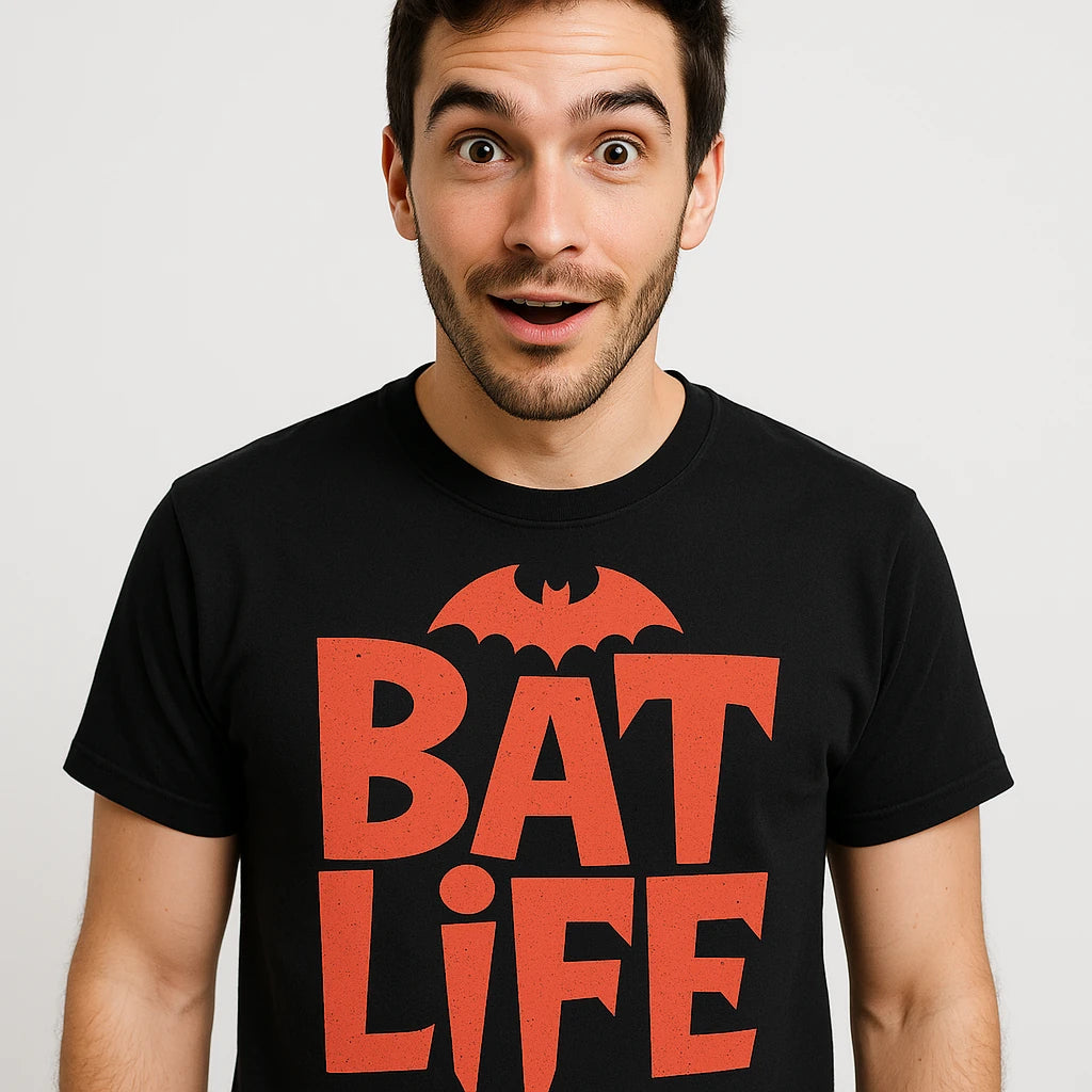 Close-up of the "Bat Life" orange print on a premium Bella+Canvas black mystic grill vampire diaries t shirt
