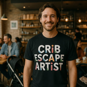 Lifestyle shot of the "Crib Escape Artist" black new parents shirts in a real-world setting