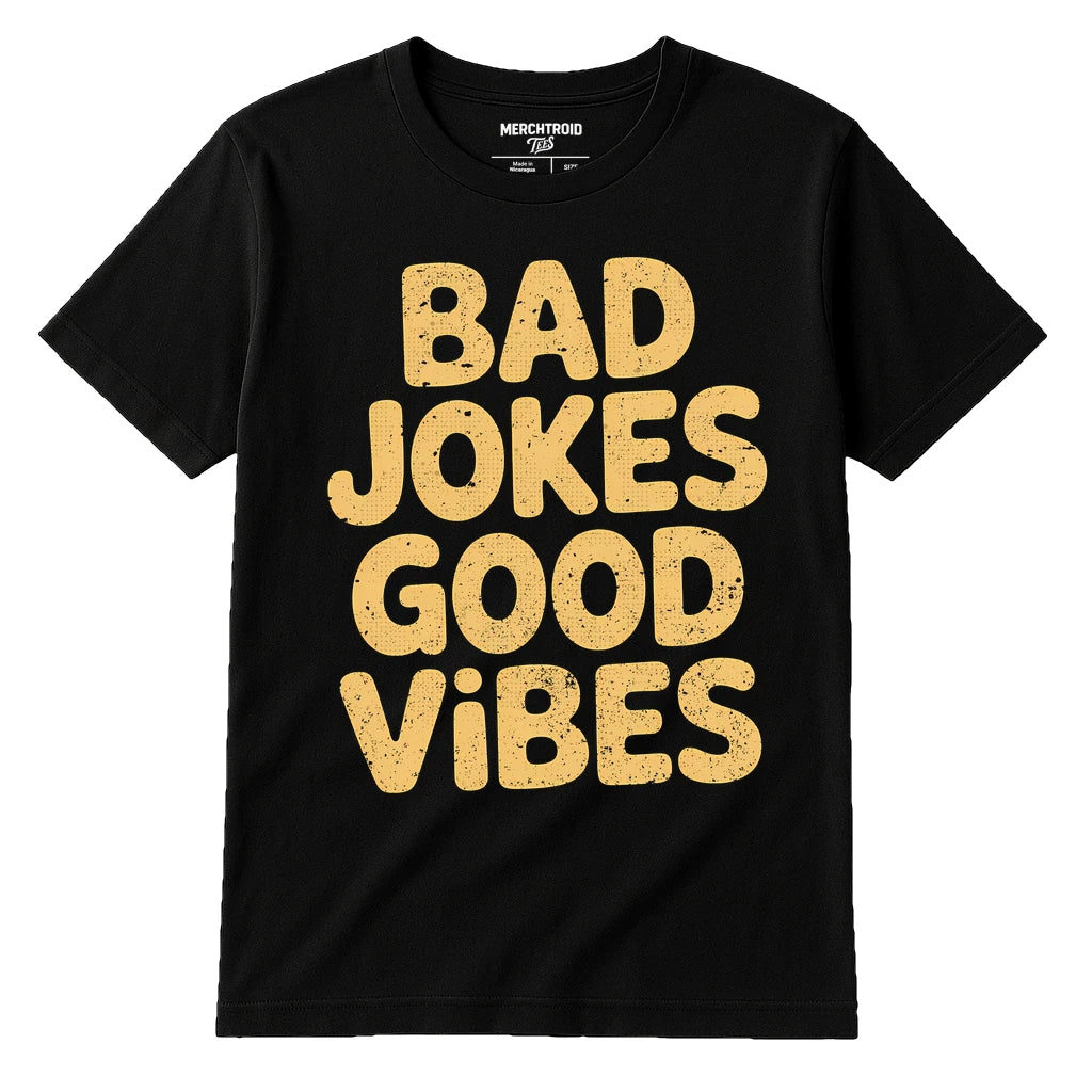A black T-shirt with bold, yellow text on the front that reads "BAD JOKES GOOD VIBES." The shirt is displayed against a white background.