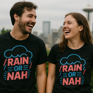 Person wearing the black rain bow t shirt graphic tee - "Rain Or Nah" design