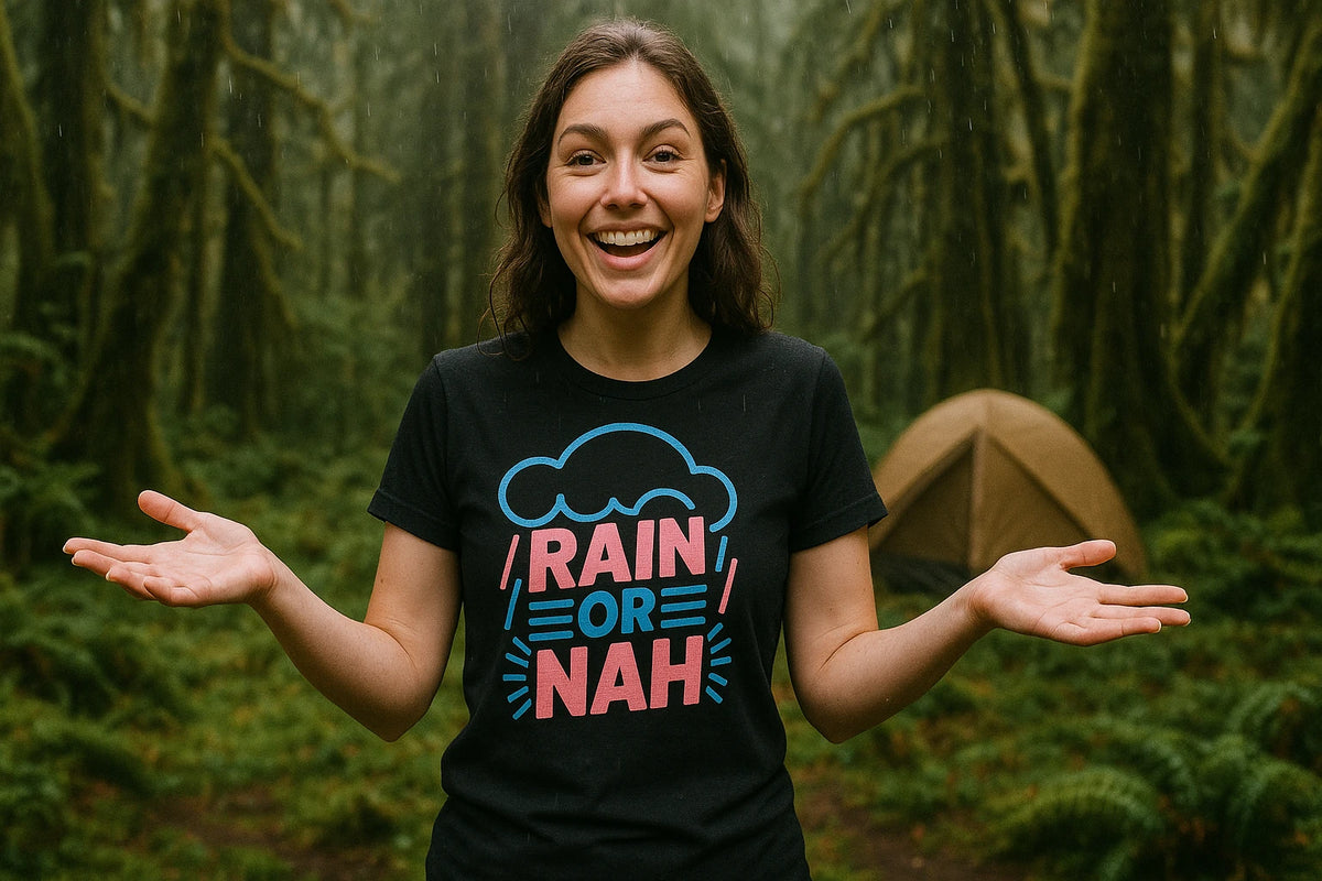 Lifestyle shot of the "Rain Or Nah" black rain bow t shirt in a real-world setting