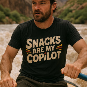 "Snacks Are My Copilot" black adventure t shirt - also one of the gifts for someone who likes adventure