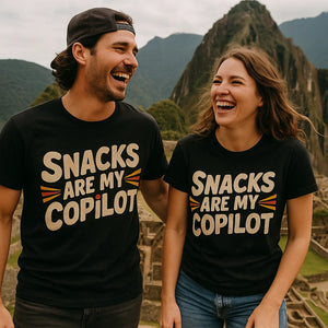 Person wearing the black adventure t shirt graphic tee - "Snacks Are My Copilot" design