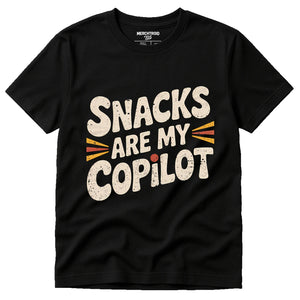 Black Adventure T Shirt - "Snacks Are My Copilot" graphic tee with cream print, flat lay product photo
