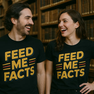 Person wearing the black studying t shirt graphic tee - "Feed Me Facts" design