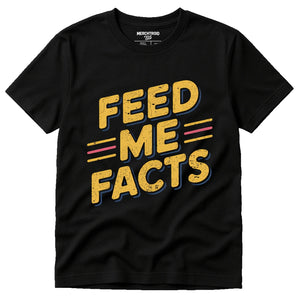 Black Studying T Shirt - "Feed Me Facts" graphic tee with gold print, flat lay product photo